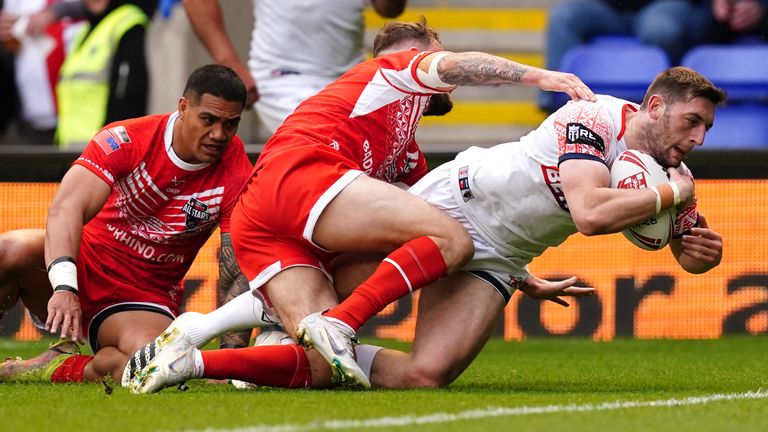 Wardle scores a try for England against the Combined Nations All Stars