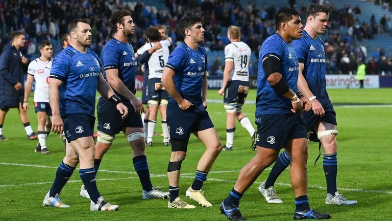 The Leinster players trudge off the field after their semi-final defeat to the Bulls