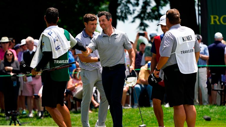 Rory McIlroy put together an opening round of eight under par at the Travelers Championship to take a joint lead with J. T. Poston