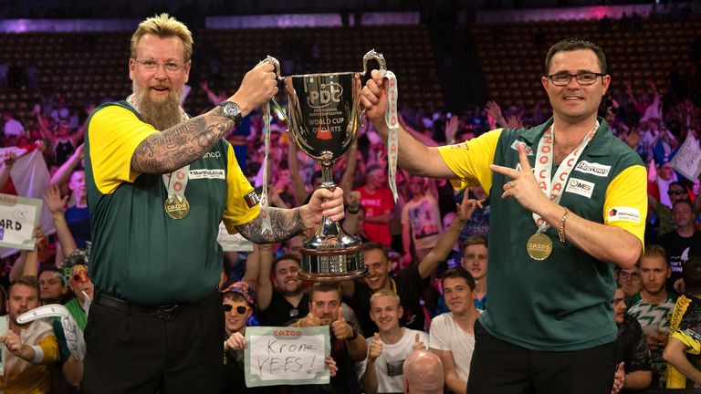 Simon Whitlock dan Damon Heta akan mempertahankan gelar World Cup of Darts mereka