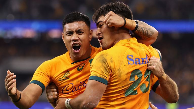 Jordan Petaia (right) celebrates after scoring his crucial second-half try