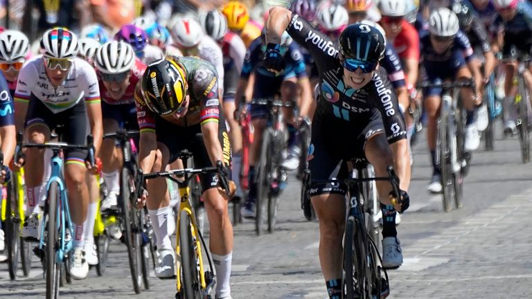 Wiebes, right, celebrates as she crosses the finish line to win the first stage of the Tour de France women's race 