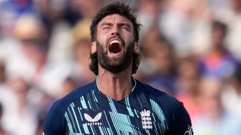 Reece Topley celebrates one of his six wickets as England levelled the series at Lord's