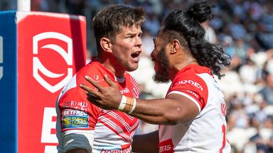 Louie McCarthy-Scarsbrook is congratulated on his second try for St Helens against Hull FC