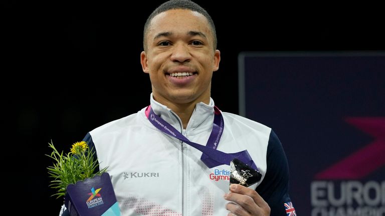 Gold medalist England's Joe Fraser celebrates his victory in the Men's All-Around Final at the European Gymnastics Championships in Munich