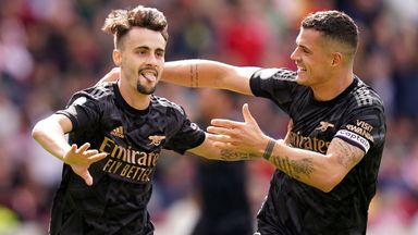 Fabio Vieira celebrates with Granit Xhaka after scoring Arsenal's third goal