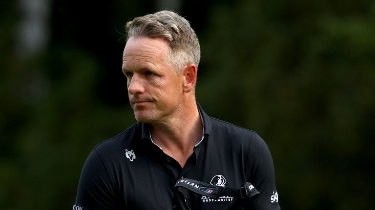 Luke Donald was on the course when there was a two-minute silence in the second lap