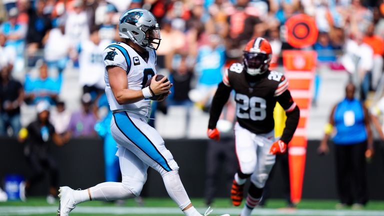 Carolina Panthers quarterback Baker Mayfield runs in for a seven-yard touchdown against his former team the Cleveland Browns