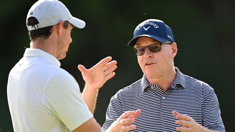 Rory McIlroy speaks to DP World Tour CEO Keith Bailey ahead of the DS Italian Open