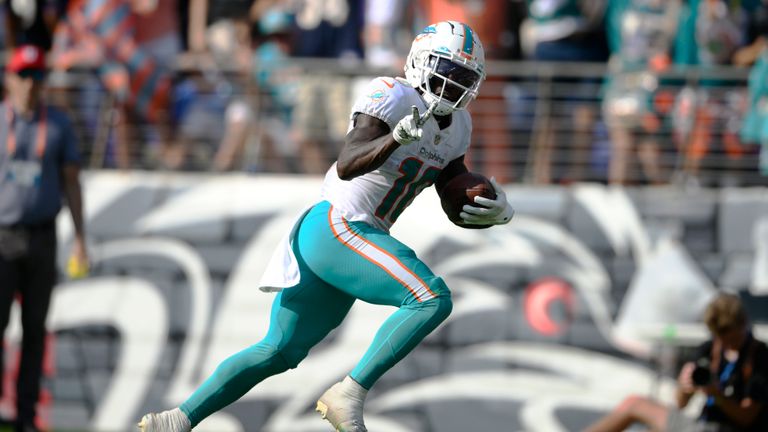 Late drama in Miami Dolphins' clash with the Baltimore Ravens as Tua Tagovailoa finds Tyreek Hill for a 60-yard touchdown to level things up in the fourth quarter. 
