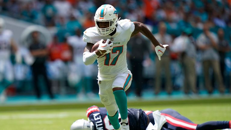 Miami Dolphins quarterback Tua Tagovailoa connects with Jaylen Waddle for a 42-yard touchdown