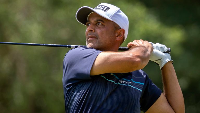 India's Arjun Atwal is among a group one shot off the lead, in his first golf for three months since the death of his father 