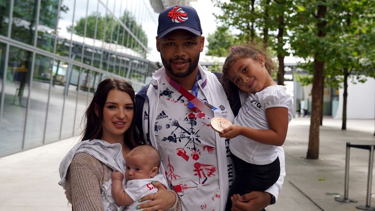 2020 Olympic bronze medallist Frazer Clarke with partner Danni-Leigh Robinson and children Trent and Mila 