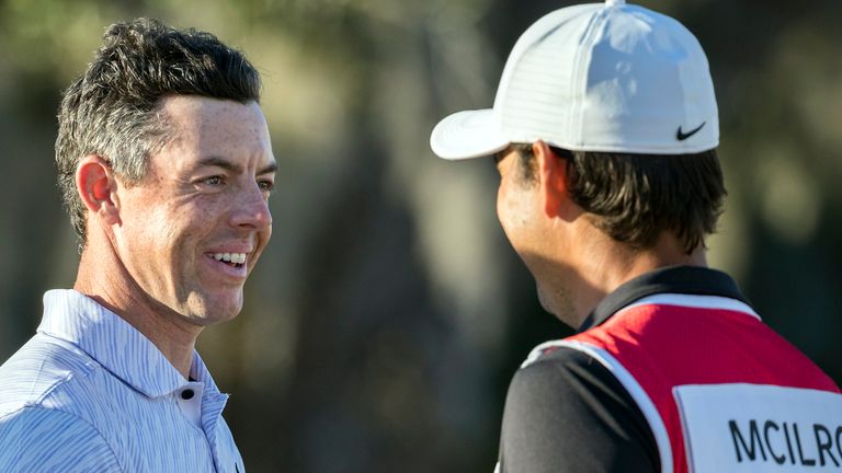 Rory McIlroy celebrated his third win of the year with caddy Harry Diamond