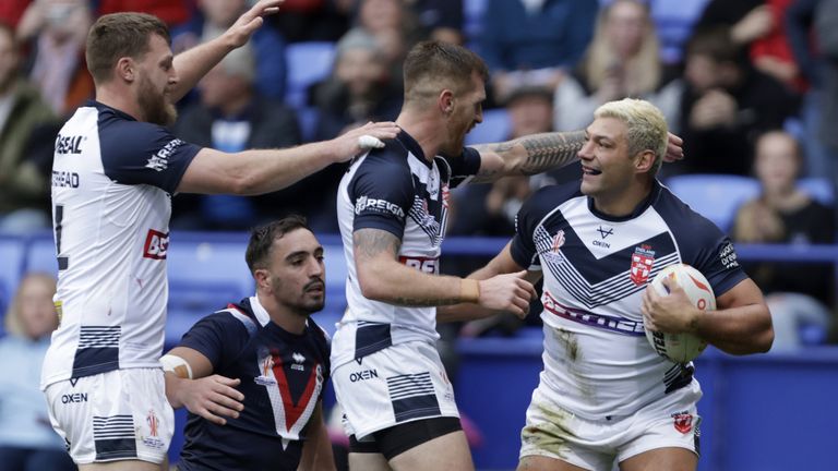 Ryan Hall celebrates a try for England against France