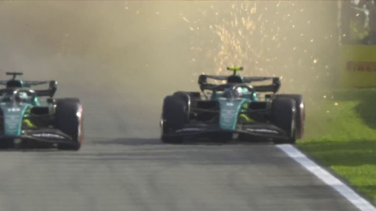 Lance Stroll forces his Aston Martin teammate Sebastian Vettel onto the grass during the Sprint.