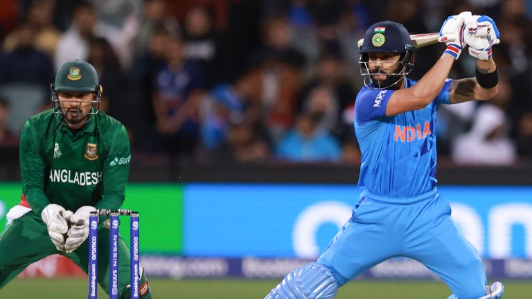 India defeat Bangladesh by five runs, helped by a Virat Kohli 64 with the bat in the T20 World Cup