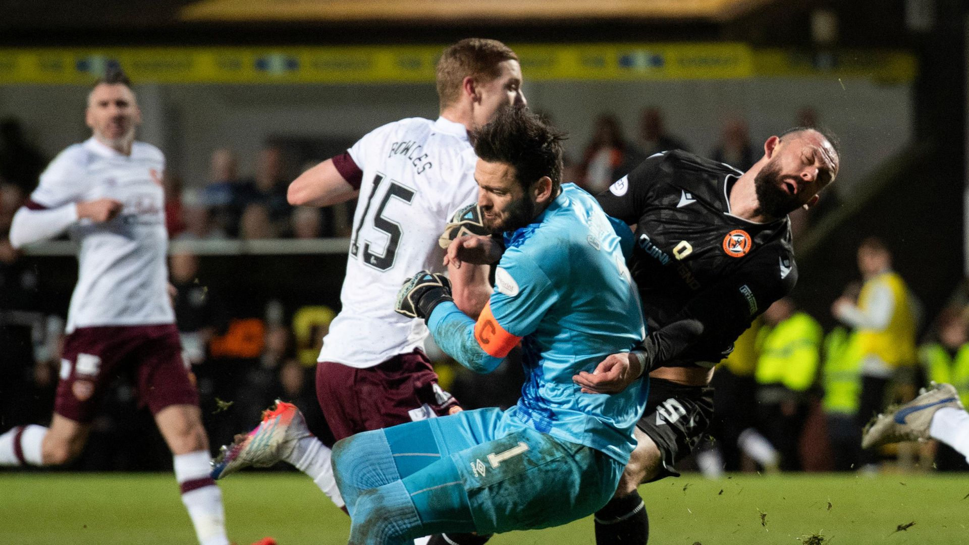 Gordon suffers horror injury as Hearts battle back to draw at Dundee Utd