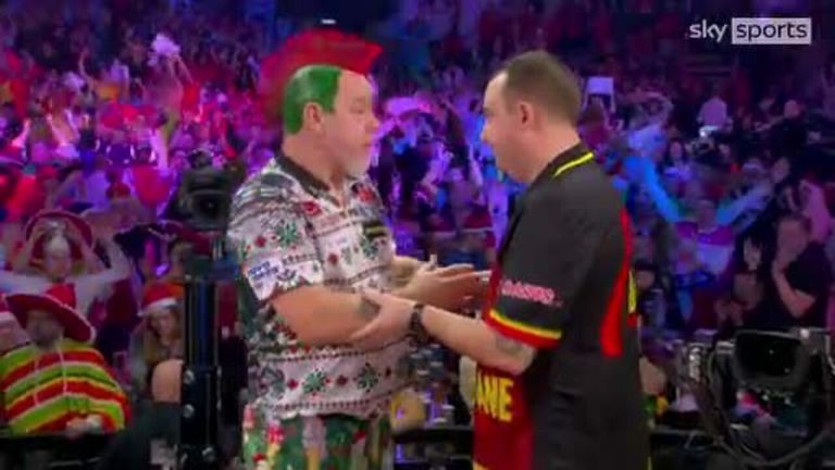 Kim Huybrechts beats world champion Peter Wright in a surprise 4-1 win as he sets up an all-Belgian last-16 match against Dimitri Van den Bergh