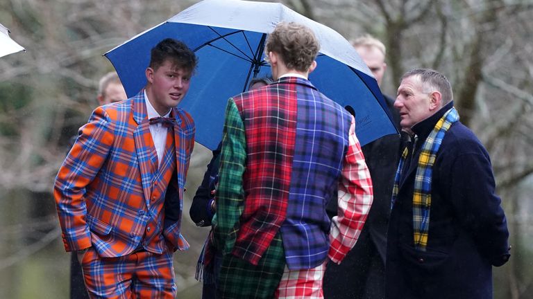 Weir's sons Ben (left) and Hamish talk to former Scotland international Gary Armstrong (right) 