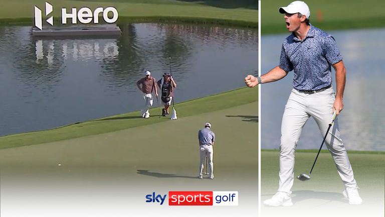 Rory McIlroy sank a pressure putt on the 18th to avoid a play-off with rival Reed and claim the Dubai Desert Classic title