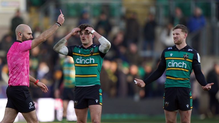Referee Andrea Piardi shows a red card to Northampton Saints' Lukhan Salakaia-Loto in the dying moments of the game