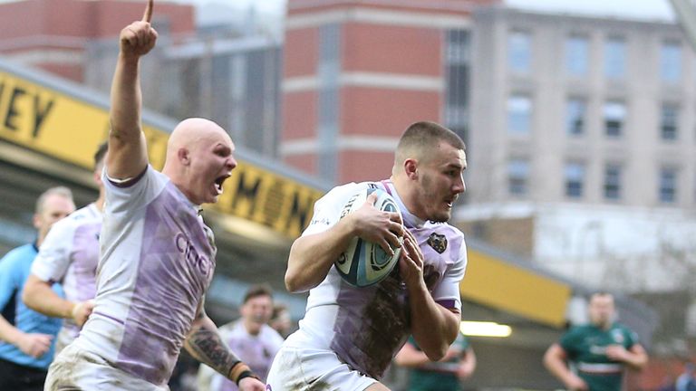 Ollie Sleightholme runs in the crucial try for Northampton