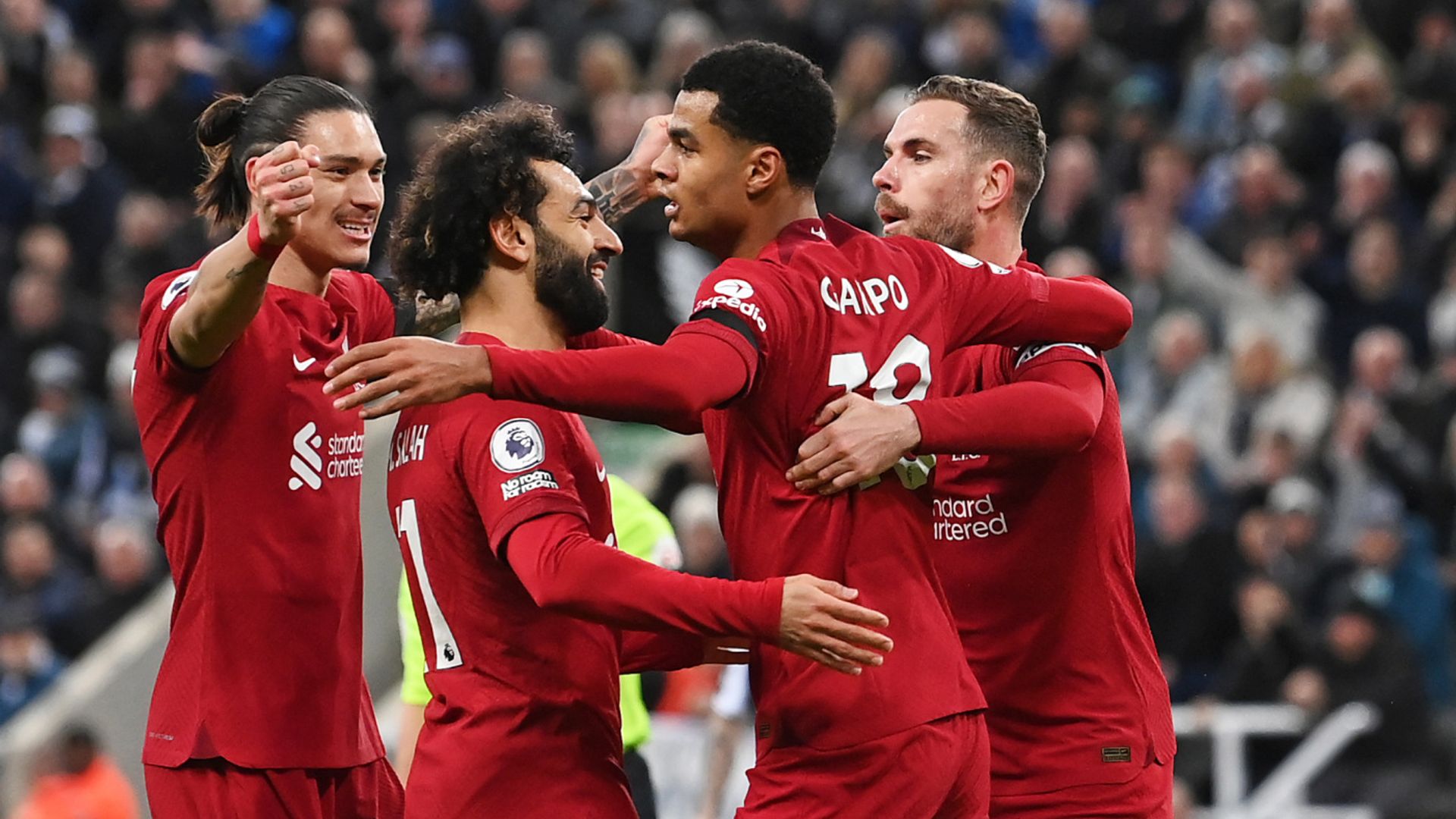 Liverpool beat 10-player Newcastle to open up top-four race