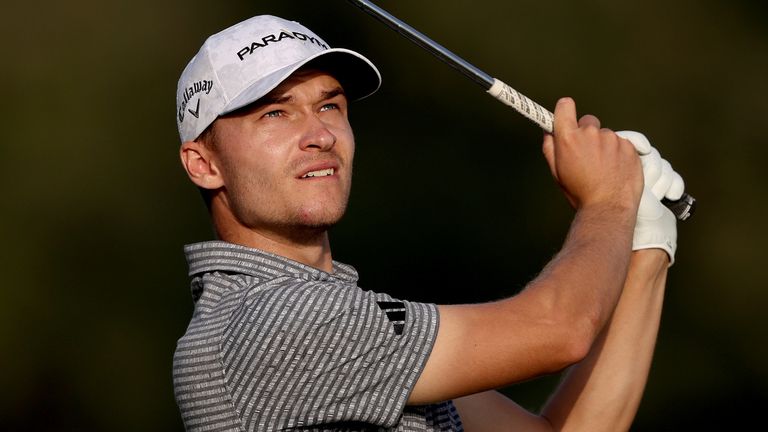 Rasmus Hojgaard is one shot off the lead in the UAE as he tries to win the title his twin brother Nicolai scooped in 2022