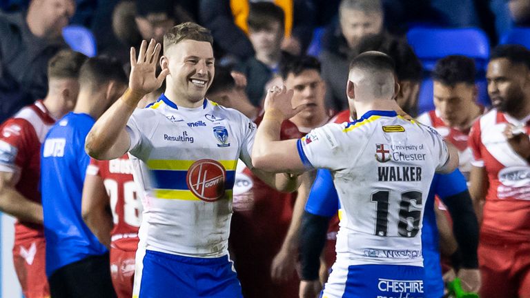 Warrington's George Williams celebrates his try against Salford
