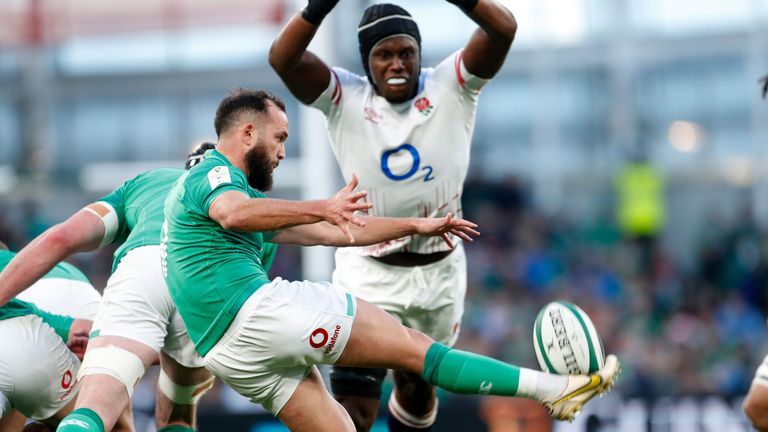 Maro Itoje charges down a kick from Jamison Gibson-Park during Sunday's game at the Aviva Stadium