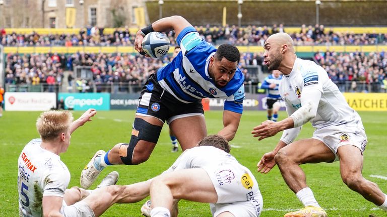 Joe Cokanasiga jinks through the Exeter defence to score