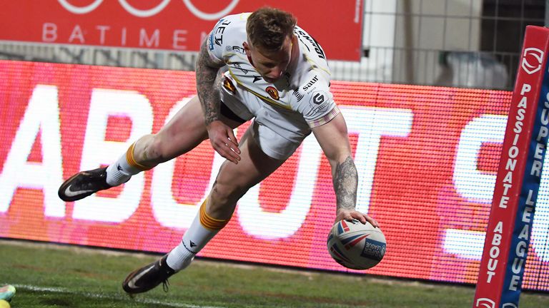 Tom Johnstone goes over for a try in Catalans' win over Hull FC