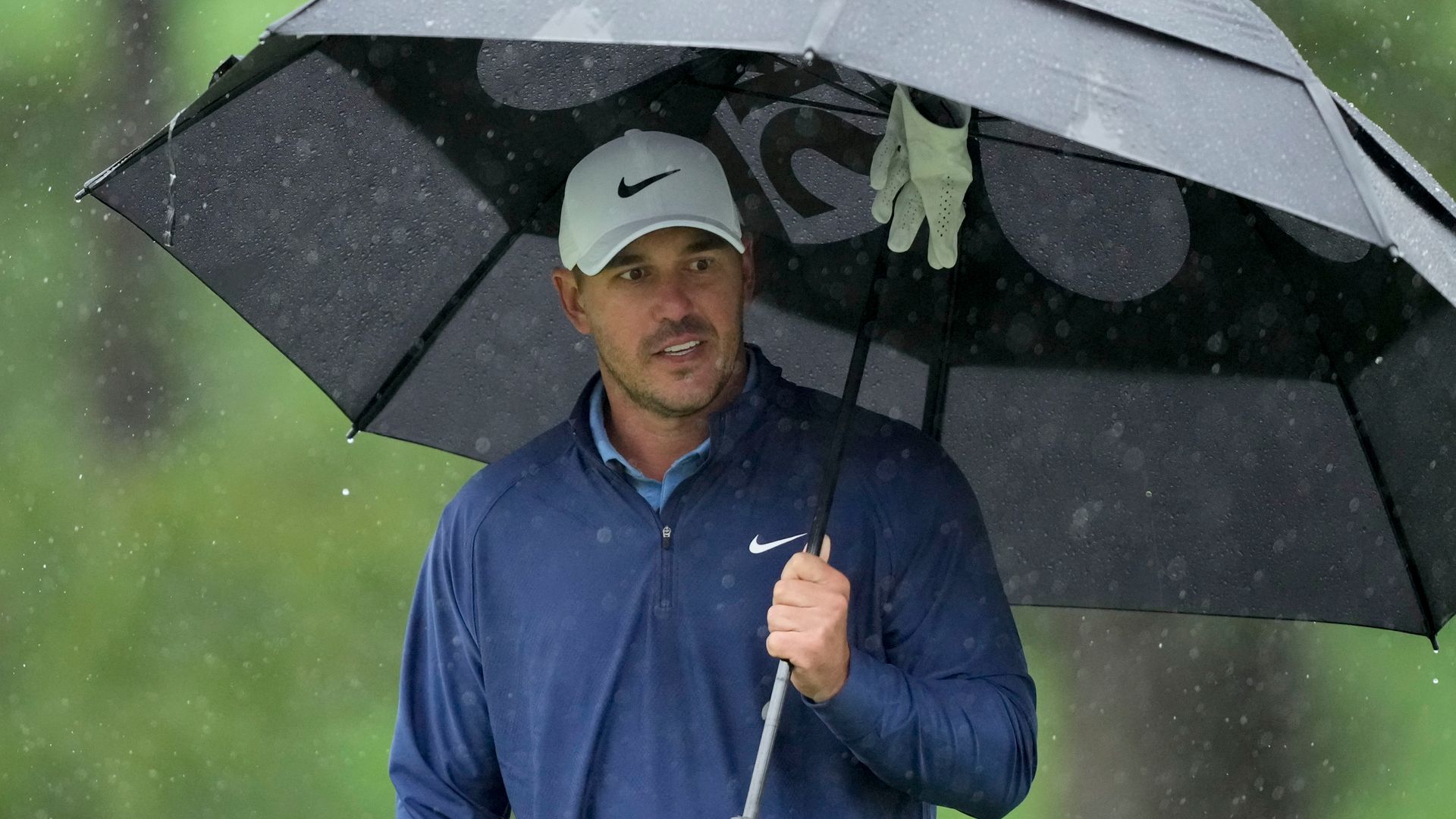 Koepka pulls clear of Rahm before play suspended at The Masters