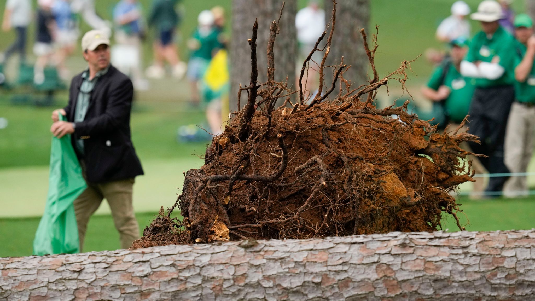 Masters second round suspended for day after strong storms down trees