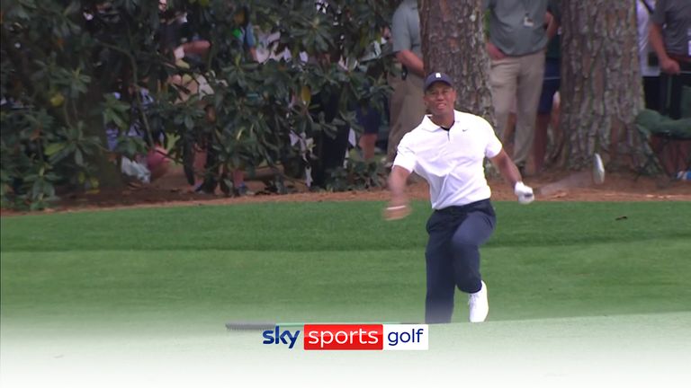 Tiger Woods appeared to be in pain following his bunker shot on the last hole of his first round
