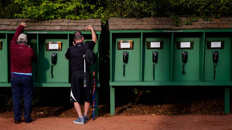 With mobile phones prohibited, spectators can use phones on the course instead