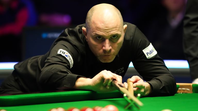 Joe Perry beat Mark Davis 10-9 to reach the first round of the World Snooker Championship in Sheffield