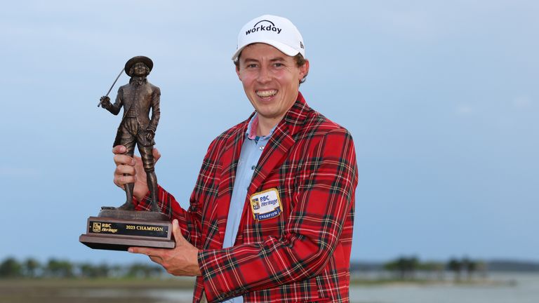 Matt Fitzpatrick of England celebrates with the RBC Heritage trophy in the Heritage Plaid tartan jacket after winning in a playoff