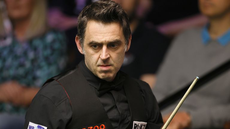 Ronnie O&#8217;Sullivan won seven successive frames as he thumped Hossein Vafaei 13-4 in their Crucible grudge match to reach the quarter-finals of the World Snooker Championship