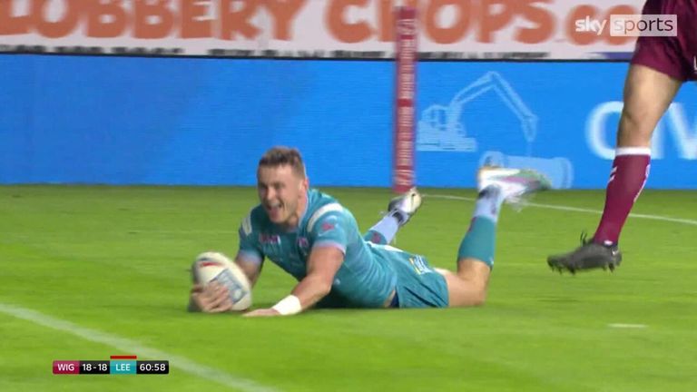 A second interception try from Harry Newman saw 12-player Leeds reclaim the lead over Wigan