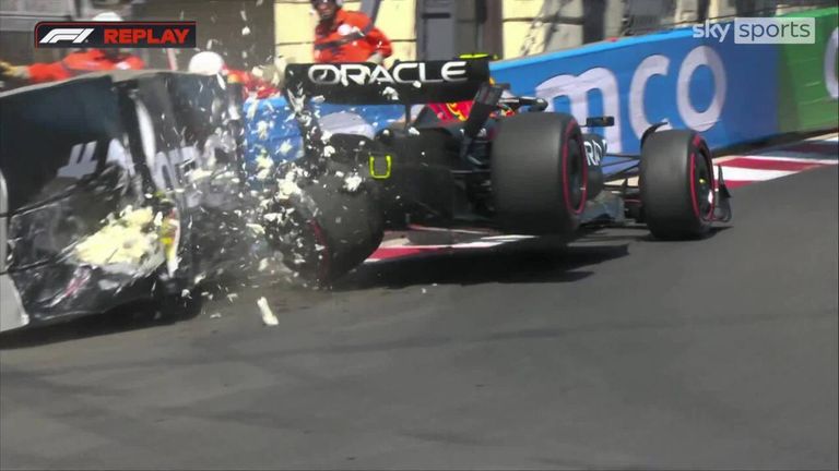 Sergio Perez hits the wall at Turn 1 which leaves his Red Bull with a huge hole in the left sidepod and he is out in Q1!