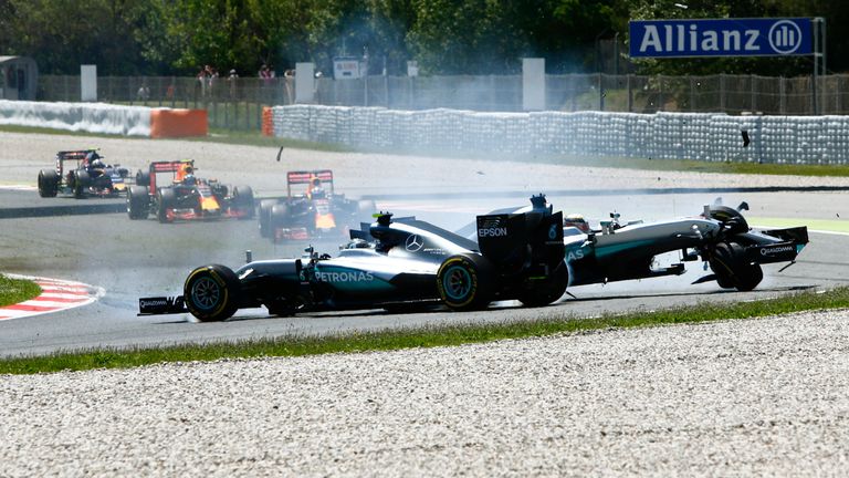 Nico Rosberg and Lewis Hamilton dramatically collide on the opening lap of the 2016 Spanish Grand Prix
