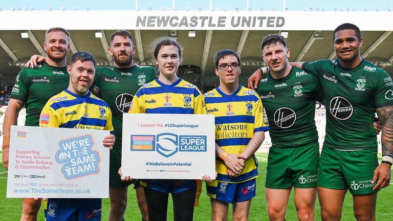 Players from Warrington's LDRL team with members of the Wolves' Super League squad at last year's Magic Weekend