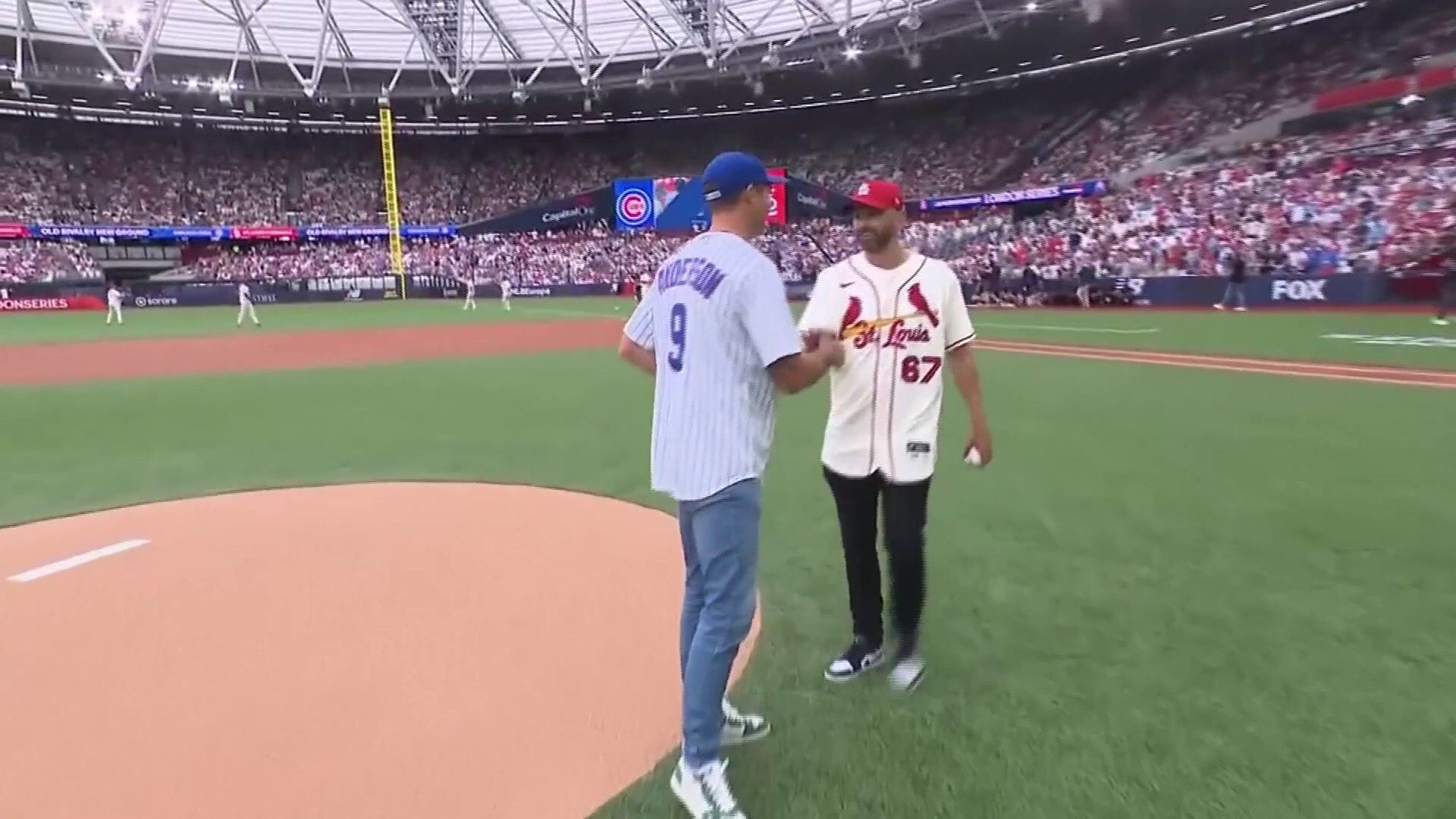 Who did it better? Ashes rivals Anderson and Lyon throw first baseball pitch