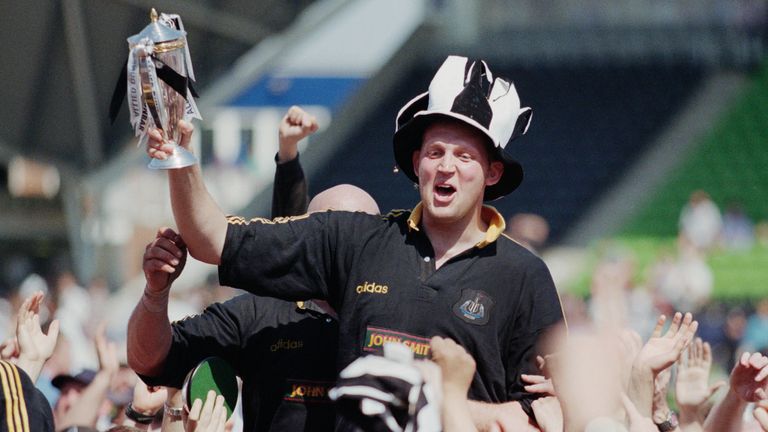 Weir celebrates winning the Premiership with Newcastle in 1998