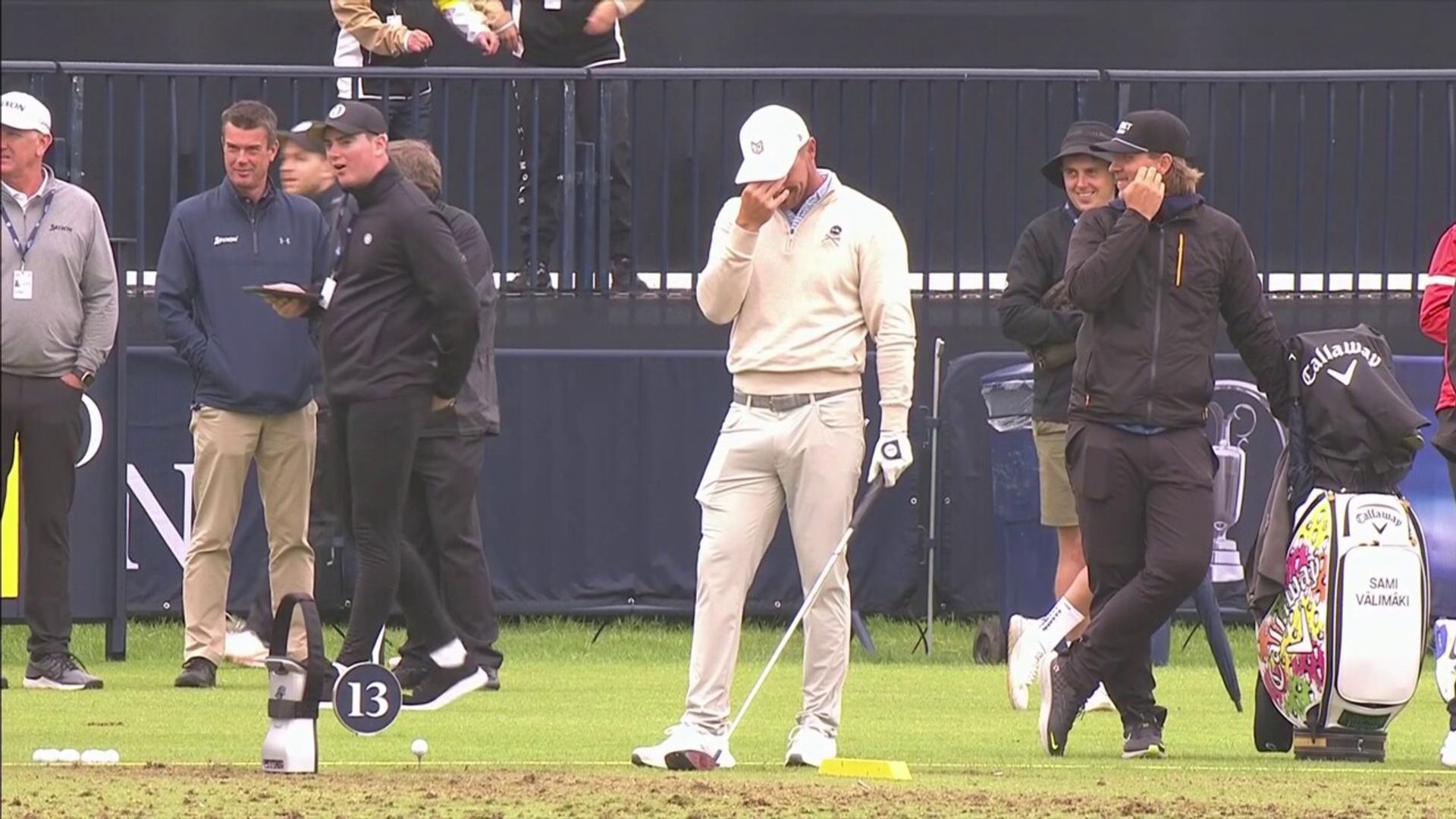 Excited fan distracts DeChambeau on the range!