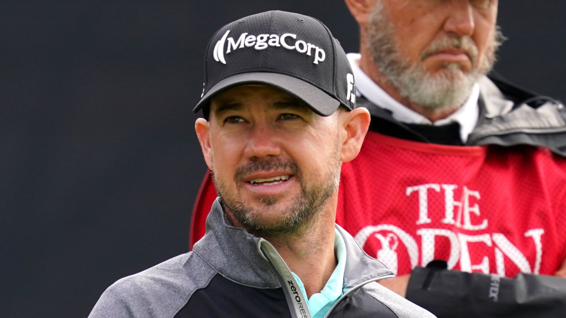 Harman hails 'hot putter' after setting daunting Open target