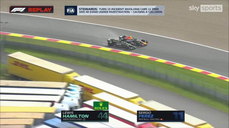 Lewis Hamilton and Sergio Perez make contact as they go wheel to wheel through the Stavelot corner.