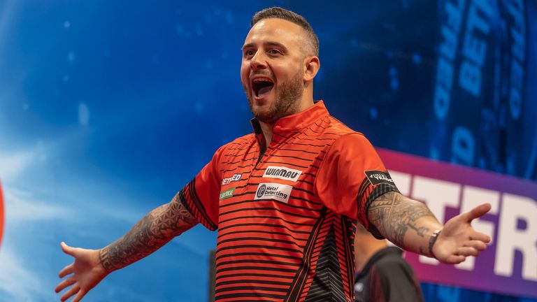 Joe Cullen celebrates at the World Matchplay Darts